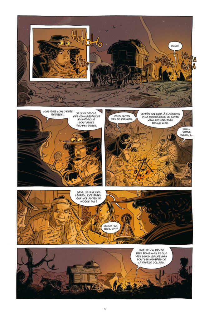 Une scène de bande dessinée se déroulant dans un paysage désertique, montrant plusieurs personnages discutant près d'une charrette. L'un des personnages porte un chapeau et utilise des lunettes, tandis que d'autres réagissent à ses paroles. L'ambiance est humoristique.